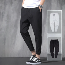 2025 New Korean Ice Silk Elastic Trousers Four Seasons Thin Casual Men'S Loose 9-Point Large Size Small Foot Sports Pants Spring