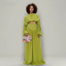 ROMISS Solid Pleated Women's 2 Piece Sets O Neck Long Sleeve Top High Waist Irregular Spliced Lace Up Skirts Runway Suit Female