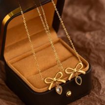 ANENJERY 316L Stainless Steel Bowknot Water Droplet Zircon Pendant Necklace For Women Sweet Simple Elegant Jewelry Wholesale