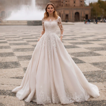 Lhuilier Customized A-line Scoop Neck Pearls Beaded Wedding Dresses Lace Appliques Long Sleeves Bridal Dress with Chapel Train