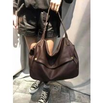 The New 2023 First Layer Cowhide Pandora Box Woven Bag is a One-Shoulder Cross-slung Bag for Women