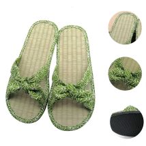 Scarpe da donna alla moda Sandali Pantofole da donna con tappetino in paglia Pantofole da spiaggia in rattan con fiocco casual Scivoli infradito piatti da donna per la casa
