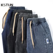Jeans für Männer Loose Fit Jogger Hosen Overs ize Baggy Pants Harem weites Bein elastische Taille Kordel zug männliche Jeans hose verjüngt