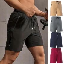 Pantaloni da uomo estivi palestra allenamento corsa ciclismo asciugatura rapida traspirante coulisse in vita pantaloncini sportivi riflettenti