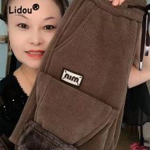 Winterkleid ung Frauen Vintage hohe Taille Taschen Lamm Plüsch warme Harems hose y2k weibliche lässige Streetwear solide lose Pantalones