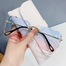 Randlose Sonnenbrille für Damen, Ozeanlinse, unregelmäßiger Rahmen, UV-Schutz