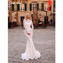 Sexy Illusion Spitze Meerjungfrau Langes Hochzeitskleid Bescheidenes Brautkleid mit hohem Kragen und langen Ärmeln Maßgeschneiderte romantische Kleider für die Braut