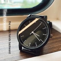 Geschenk Enmex Rückwärts-Armbanduhr, kreatives Design, Rückwärtszeit, einfacher Stil, lässige Quarz-Linkszeigeruhr gegen den Uhrzeigersinn