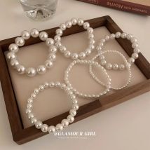 Elegante weiße Kunstperlen-Perlenarmbänder für Frauen, verstellbares elastisches Seilarmband, französische Luxus-Hände, Schmuckzubehör