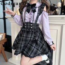 Japanischer Stil Mass-produced Mine Lila Off-the-Shoulder-Shirt Damen Lose Schleife Langarmblusen Karierter Trägerrock Herbst