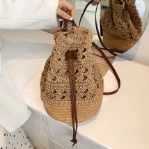 Handgemachte Frauen Sommer Stroh Strand Umhängetasche gewebte hohle Kordel zug Umhängetaschen gestrickte Mode weibliches Design Reisetasche