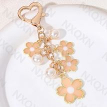 Hübscher Blumen-Perlen-Emaille-Schlüsselanhänger, Pflanze, klassischer Schlüsselanhänger für Frauen, Mädchen, Freundschaft, Geschenktüte, Dekoration, handgefertigter DIY-Schmuck