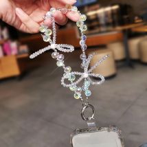 Transparentes Telefon-Lanyard mit Schleife und Kristallen: Elegante Handgelenkverzierung für Damen, Anti-Verlust-Lanyard mit Clip