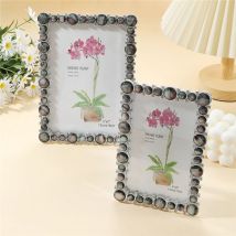 Schwarzer Fotorahmen mit natürlicher Muschel. Kann 6 Zoll/7 Zoll Fotos aufbewahren, geeignet für Raumdekoration, Halloween- und Weihnachtsdekoration