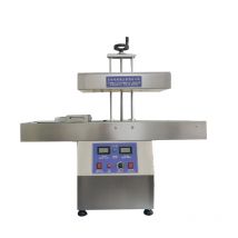 Macchina per sigillare il foglio di alluminio a induzione elettromagnetica per la macchina per termosaldatura della guarnizione del foglio di alluminio della bottiglia di vetro della bottiglia di