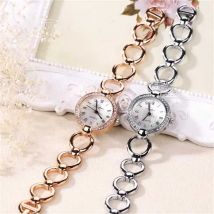 Rose Gold Luxus Frauen Kleid Uhren Mädchen Quarzuhr Armband Uhr Damen Mode Kristall Armbanduhr Frauen Uhr