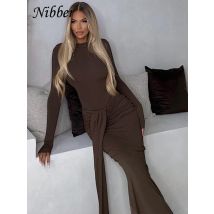 Nibber Lässiges, elegantes Damen-2-teiliges Set, einfarbig, O-Ausschnitt, volle Ärmel, Body + Falten, Quaste, dünne Röcke, passende Hipster-Anzüge