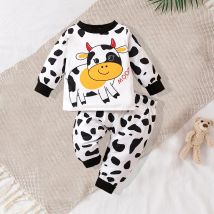 Zweiteiliges, süßes und modisches Set aus langärmligem Rundhals-Oberteil und Hose mit schwarz-weiß geflecktem Kuhmuster für Babys
