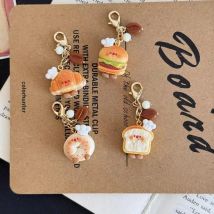Niedlicher simulierter Brot-Schlüsselanhänger, lustiger Lebensmittel-Schlüsselanhänger, schöne Taschenanhänger, Kopfhörer, hängende Dekoration, Freunde, Geschenke