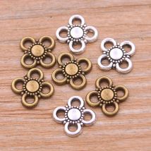 60pcs 10mm Großhandel neues Produkt zweifarbige kleine Blume Charms Pflanze porösen Stecker Schmuck Metall legierung DIY Markierung
