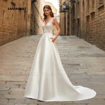 Maßgeschneidertes elegantes sexy elfenbeinfarbenes Boho-Hochzeitskleid aus Satin mit V-Ausschnitt und Taschenschleife für Frauen, Applikationen, A-Linie, Vestidos de Novia