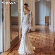 Verträumtes, perlenbesetztes, langärmliges Hochzeitskleid, luxuriöse Federn, Meerjungfrau-Brautkleid 2025, maßgeschneiderte rückenfreie Kleider für die Braut
