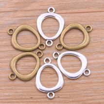 20pcs 18*27mm Großhandel neues Produkt zweifarbige ovale Charms Geometrie Stecker Schmuck Metall legierung DIY Markierung