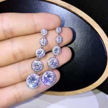 Huitan neue trend ige baumeln ohrringe für frauen 5 runde kubische zirkon verknüpfte design luxus braut hochzeits feier ohrringe schmuck