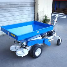 Selbstfahrender Kompostspreizer. Doppelscheiben-Rasenspreizer. Rotierender Gartendüngerstreuer mit großer Reichweite