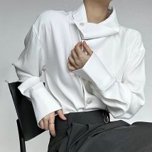 Camicia a maniche lunghe in tinta unita a maniche lunghe da uomo nuova primavera 2025 Elegante retrò di fascia alta Moda scollo allentato Design Irregolare Top da uomo