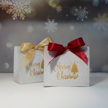 Confezione regalo e sacchetti di buon Natale con nastro per avvolgere biscotti e scatole di caramelle Sacchetti regalo di Natale Design e nastro in lamina d'oro