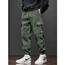 Frühling Herbst Neue Stil Elastische Taille Casual Hosen für Männer Stretch Gerade Kordelzug Harem Jogging Sport Lange Hosen Männlich