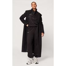 PRETTYLITTLETHING Jogging noir à bas resserré et slogan Est 2012, Noir