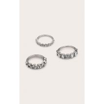 Lot de trois bagues superposable clairs en métal argenté à strass, Argenté