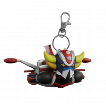 Fabriqué En Plastique, Ce Porte-clés Plastoy Représente Goldorak Dans Sa Soucoupe Porteuse. Le Porte-clés Mesure 4 X 8,5 X 5,2 (hxlxp).