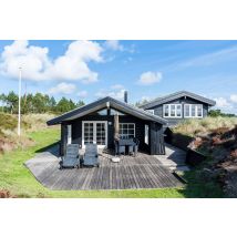6 person holiday home on a holiday park in Henne