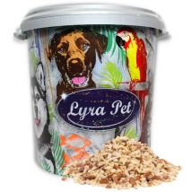 10 kg de noyaux de cacahuètes Lyra Pet hachés avec la peau dans un bac de 30 l
