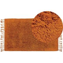 Beliani - Boho Area Rug Cotton Shaggy 80 x 150 cm with Tassels Orange Bitlis - Orange