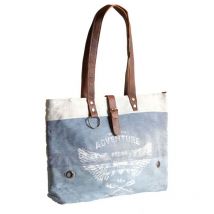 Bolsa vaquera con la inscripción Adventure