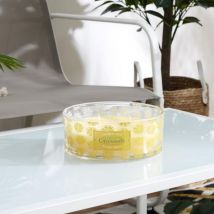 Bougie parfumée 25h limone à la cire de paraffine senteur citronnelle motif citron coupé