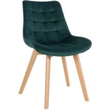 Chaise verte en velours ruisselant