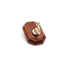 Gancio adesivo holz noce/oro 1P CM.4X6. Prezzo per 1 pezzo.