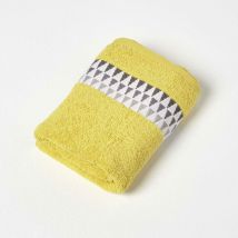 Serviette de toilette en coton jaune ocre à motif géométrique, 50 x 90 cm - Homescapes