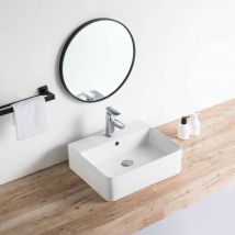 Stano. - Lavabo blanco brillante sobre encimera cerámico venado 52 x 42 cm