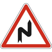 Panneau de signalisation danger - Succession de virages dont le 1er est à gauche - Triangulaire - Gamme Ecolign - Classe 1 - 700mm