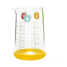 Pebbly - Pichet doseur 0.5 l en verre et silicone jaune
