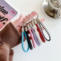 Porte-clés fait main en cuir écologique tressé