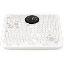 Personenwaage und weißer elektrostimulator Terraillon powermassager