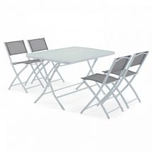 Oviala - Table de jardin et 4 chaises pliantes en acier et verre gris
