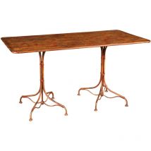 Table en fer forgé avec finition rouge antique